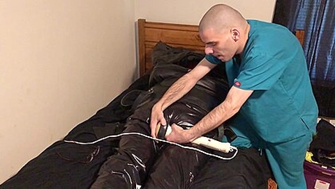 Jun 14 2022 - Rubber Boy Has A Good Time With The Vibe In His Leather Straitjacket